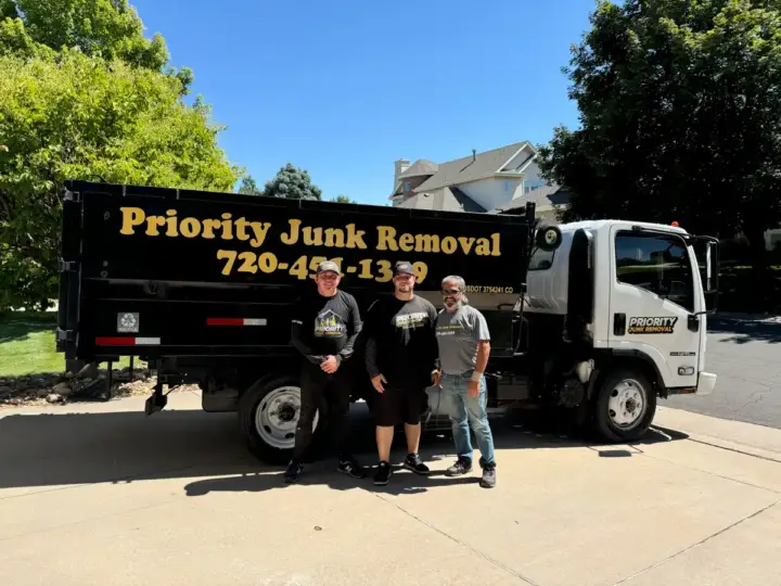 Junk removal team clearing items from a Lakewood property